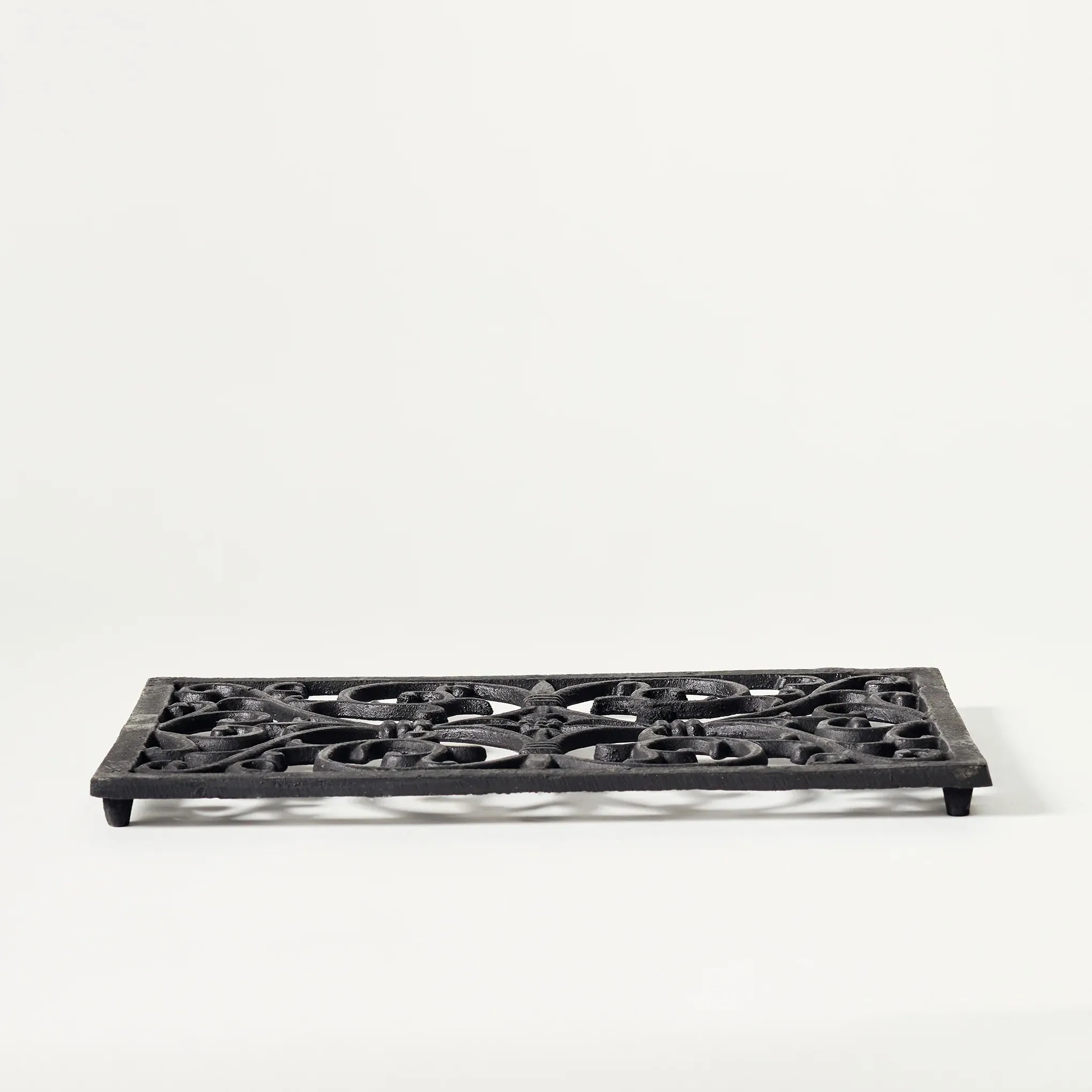 Cast Iron Decorative Trivets – Elegant and Functional Kitchen Decor