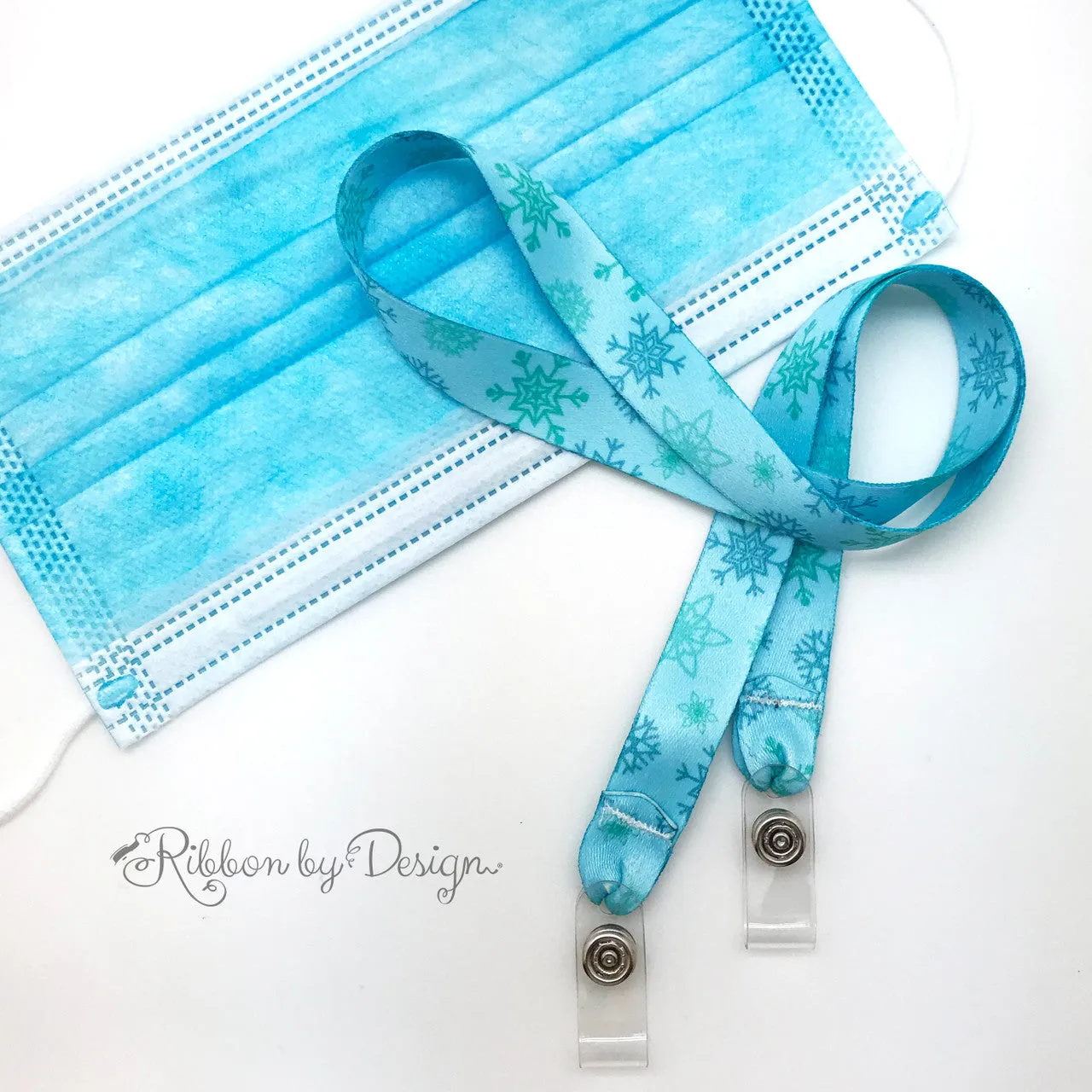 Frozen theme snowflakes Face mask holder lanyard 24" long  with vinyl  snap fittings printed on 5/8" Ultra Lanyard fabric