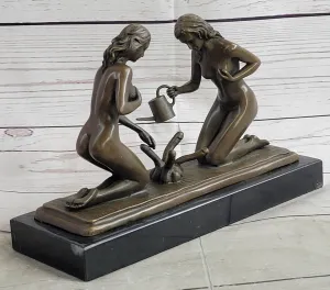 Provocative Bronze Artwork: Sensuous Nude Girl Tending to Growing Erotic Plant Statue