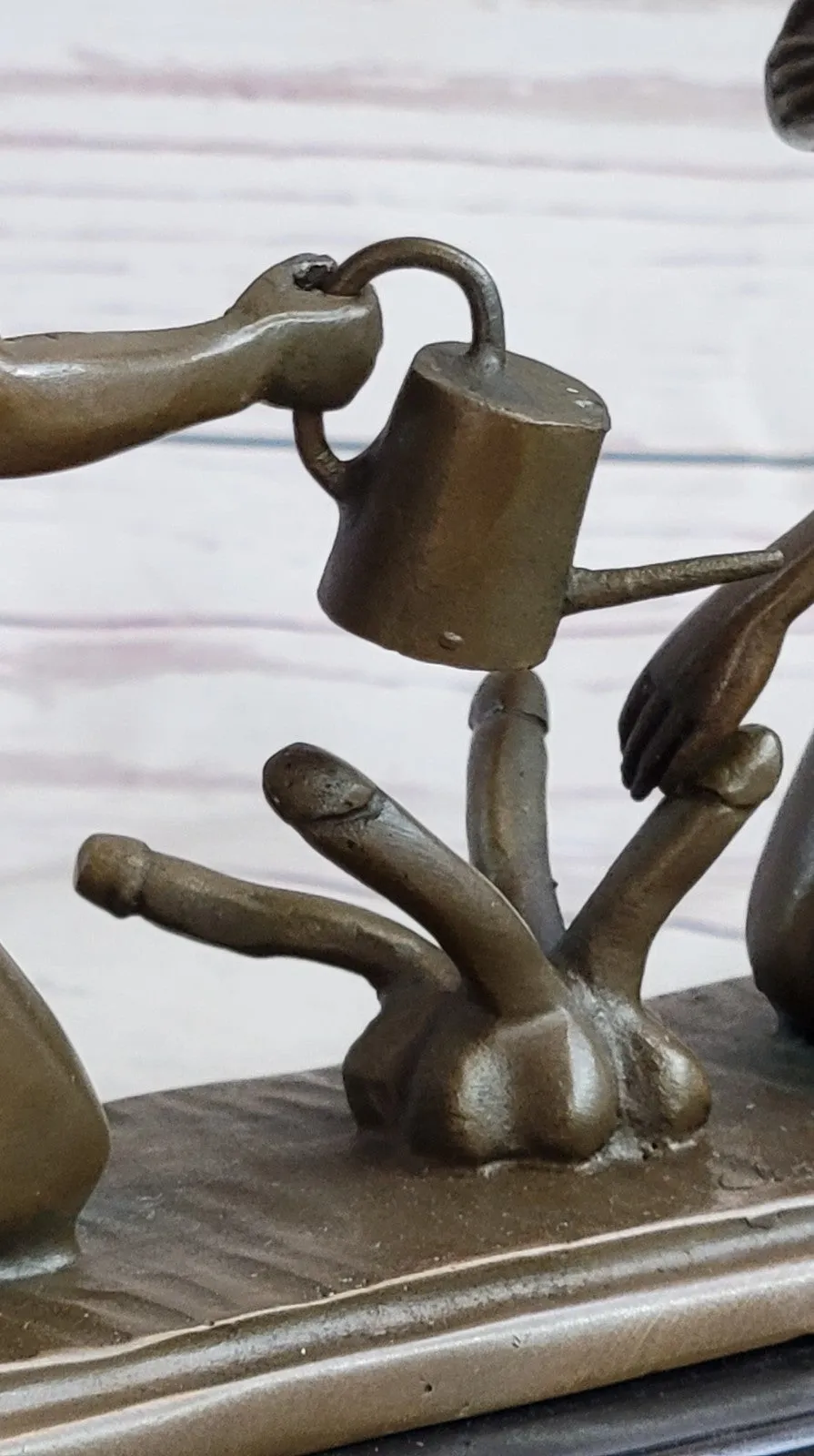 Provocative Bronze Artwork: Sensuous Nude Girl Tending to Growing Erotic Plant Statue