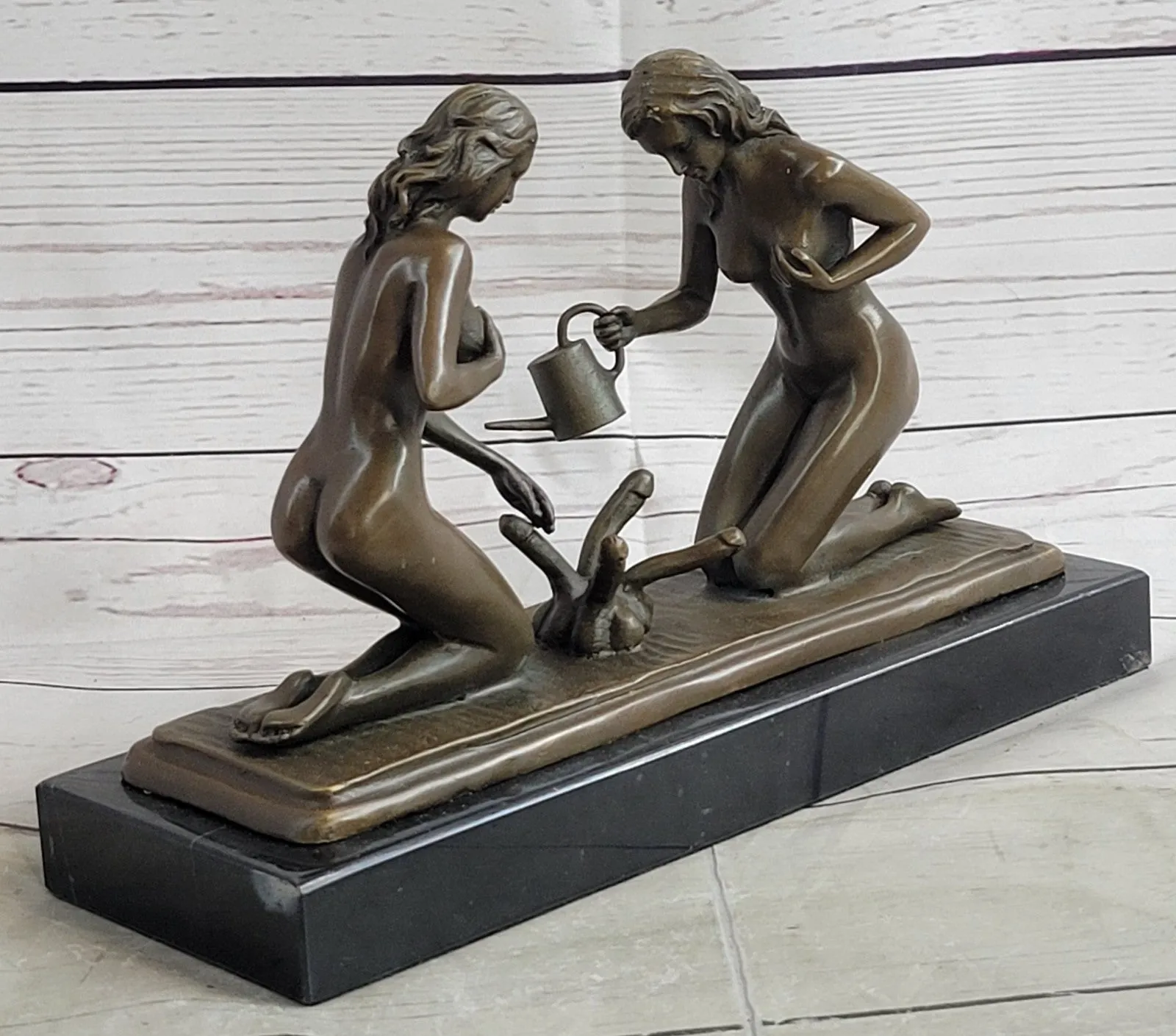 Provocative Bronze Artwork: Sensuous Nude Girl Tending to Growing Erotic Plant Statue